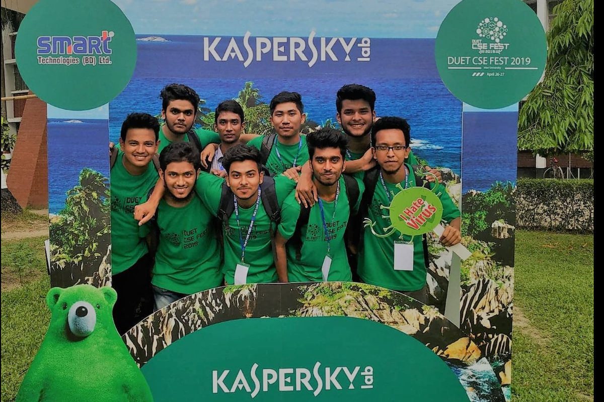 Papel Chandra and BUBT team at DUET CSE Fest 2019 with Kaspersky sponsorship banner