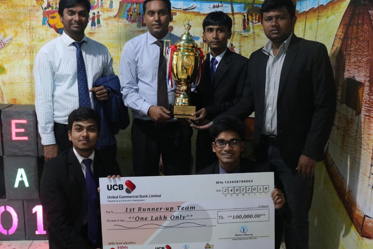 BUBT team holding champion trophy and UCB prize cheque of one lakh taka at Public Parliament Debate 2019
