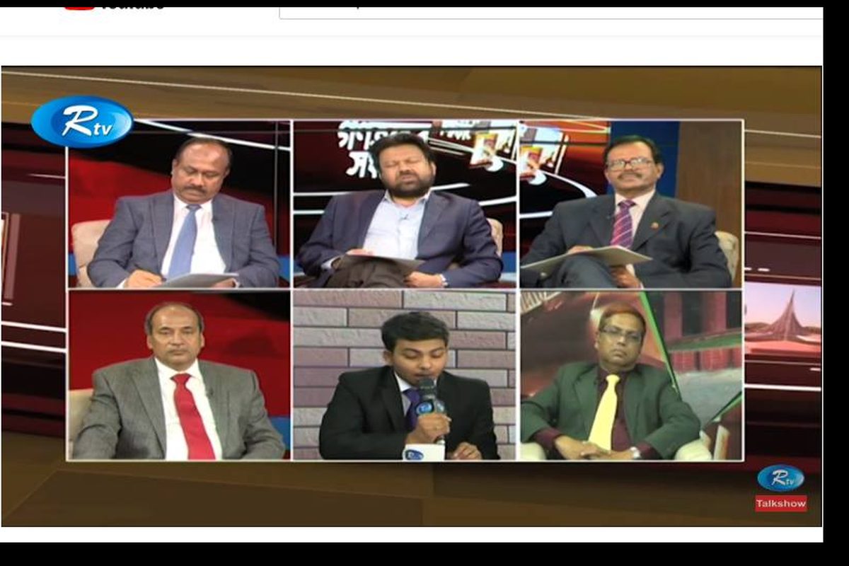 BUBT debate team with championship crest at UCB Public Parliament Debate competition